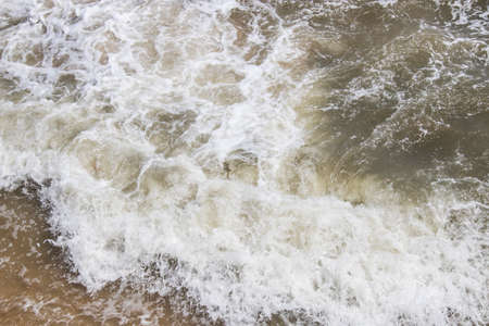 Soft wave of the sea on the sandy beach