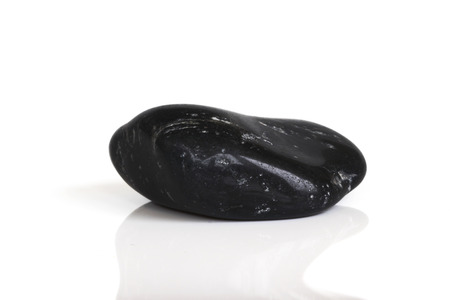 black stone isolated on white backgroundの写真素材