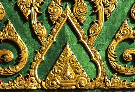 The art on a wall in temple of Thailandの写真素材