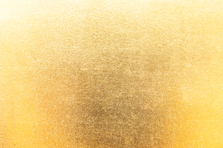 Shiny gold foil texture backgroundの写真素材