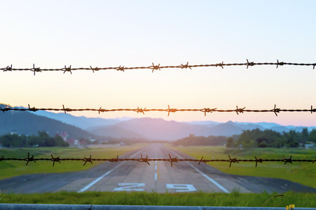 Airport runway in the evening sunset light.の写真素材