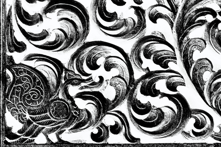 Wood carving gradient at windows of the templeの写真素材