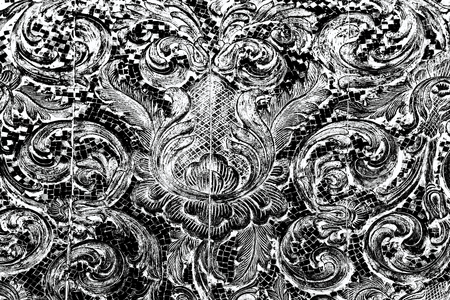 Wood carving gradient at windows of the templeの写真素材