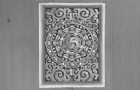 Ancient carving wooden window of Thai temple. Thailandの写真素材