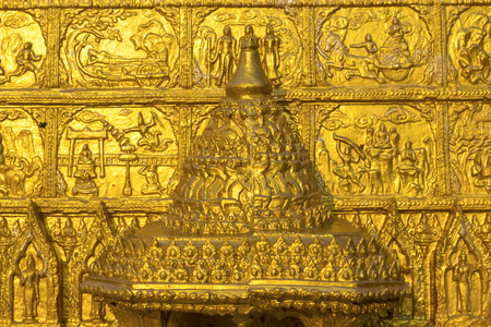 Traditional Thai carved gold pattern decorative in temple, Thailandの写真素材