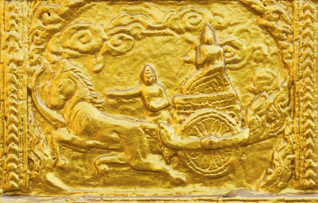 Traditional Thai carved gold pattern decorative in temple, Thailandの写真素材