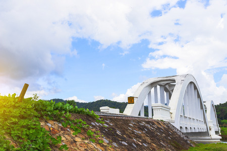 Railroad passes the white bridge at Lamphun, Thailand.のeditorial素材