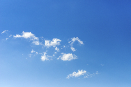 Blue sky with clouds backgroundの写真素材