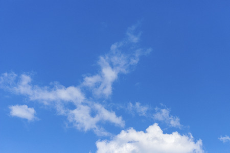 Blue sky with clouds backgroundの写真素材
