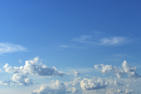 Blue sky with clouds backgroundの写真素材