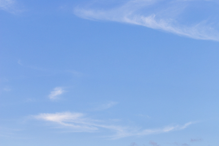 Blue sky with clouds backgroundの写真素材