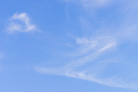 Blue sky with clouds backgroundの写真素材