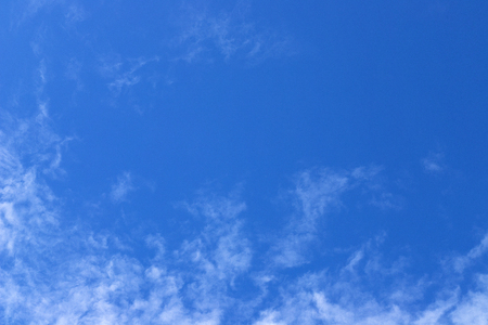 Blue sky with clouds backgroundの写真素材