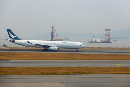 HONG KONG, CHINA - NOVEMBER 25 2018: Cathay Pacific plane in Hong Kong International Airport.のeditorial素材