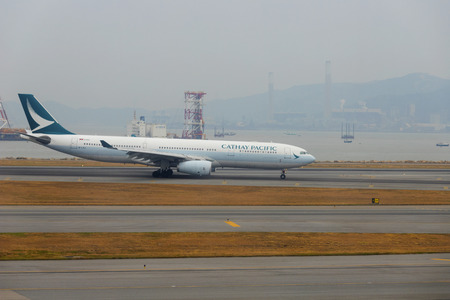 HONG KONG, CHINA - NOVEMBER 25 2018: Cathay Pacific plane in Hong Kong International Airport.のeditorial素材