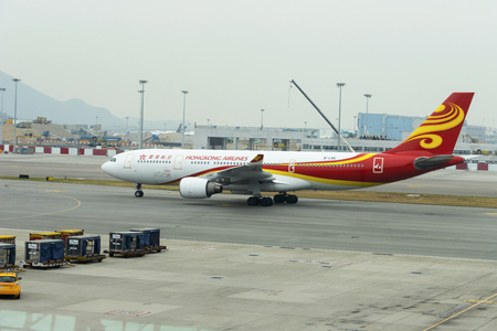 HONG KONG, CHINA - NOVEMBER 25 2018: Hongkong airlines plane in Hong Kong International Airport.のeditorial素材