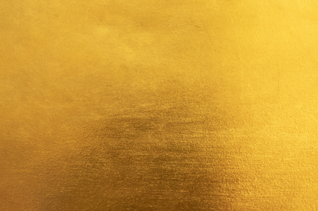 Shiny yellow leaf gold metall texture and backgroundの写真素材