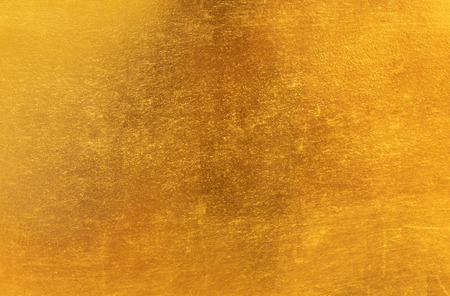 Shiny yellow leaf gold metall texture and backgroundの写真素材