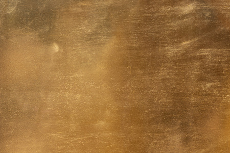 Shiny yellow leaf gold metall texture and backgroundの写真素材