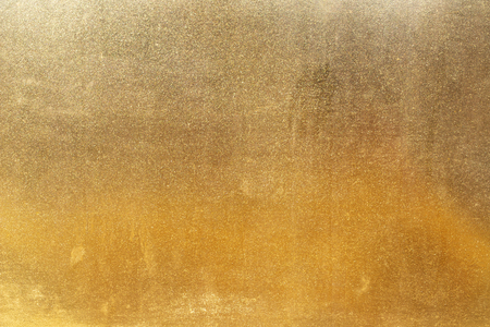 Shiny yellow leaf gold metall texture and backgroundの写真素材