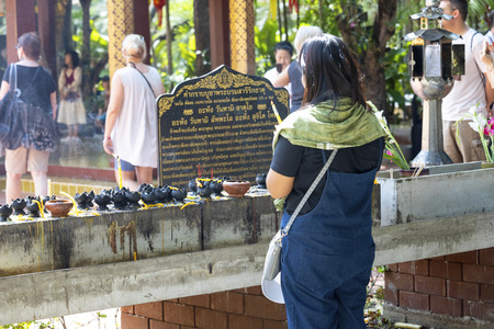 Chiangmai, Thailand, February,17, 2019, Important Buddhist Day The light at the pagoda. Worship of Lord Buddha at Wat Pra Singh Voramahavihara Chiangmai , Thailand.のeditorial素材