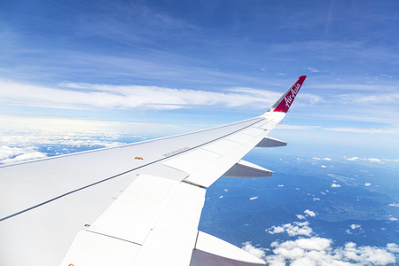 Bangkok, Thailand - JUNE 26, 2019 : Airbus 320 airasia, Thailand low-cost airline. View from the plane window by. airasia airlineのeditorial素材