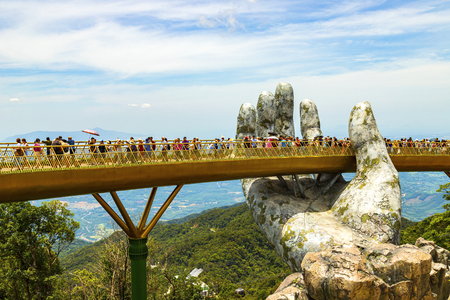 Danang, Vietnam - JUNE, 24, 2019: The Golden Bridge in the Bana Valley, supported by a giant hand This bridge is 1,400 meters above sea level.のeditorial素材