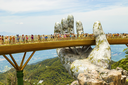 Danang, Vietnam - JUNE, 24, 2019: The Golden Bridge in the Bana Valley, supported by a giant hand This bridge is 1,400 meters above sea level.のeditorial素材