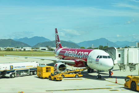 DANANG , VIETNAM - JUNE 26, 2019: The air plane airasia airline company stands at the DANANG International Airport.のeditorial素材
