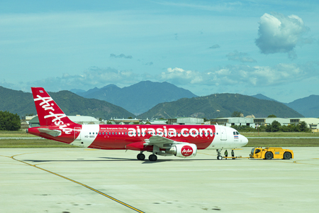 DANANG , VIETNAM - JUNE 26, 2019: The air plane airasia airline company stands at the DANANG International Airport.のeditorial素材
