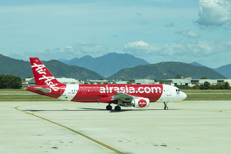 DANANG , VIETNAM - JUNE 26, 2019: The air plane airasia airline company stands at the DANANG International Airport.のeditorial素材