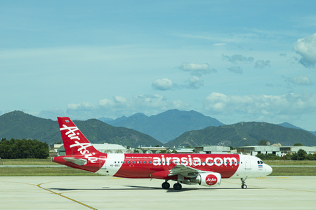 DANANG , VIETNAM - JUNE 26, 2019: The air plane airasia airline company stands at the DANANG International Airport.のeditorial素材
