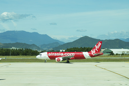 DANANG , VIETNAM - JUNE 26, 2019: The air plane airasia airline company stands at the DANANG International Airport.のeditorial素材