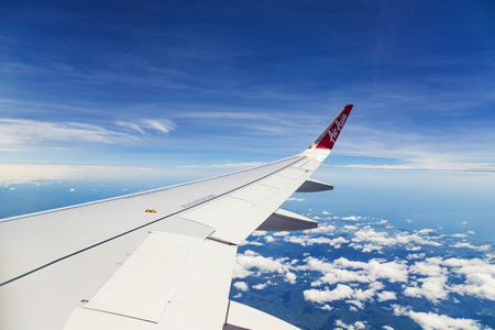 Bangkok, Thailand - JUNE 26, 2019 : Airbus 320 airasia, Thailand low-cost airline. View from the plane window by. airasia airlineのeditorial素材