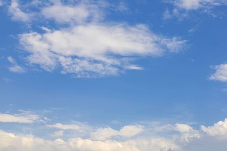 Blue sky with white clouds background.の写真素材
