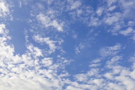 Blue sky with white clouds background.の写真素材