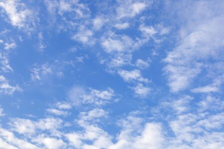 Blue sky with white clouds background.の写真素材