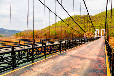 CHIANGMAI, THAILAND - April 26, 2020 : Suspension bridge at Mae Kuang Udom Thara dam, Thailand.のeditorial素材