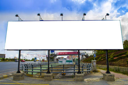 White blank billboard poster outdoor; Billboard blank with blue sky for outdoor advertising posterの写真素材