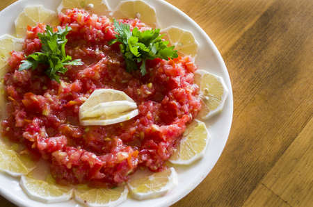 healthy and fresh salad varieties and mezes on wooden tableの写真素材