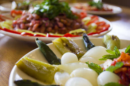 Healthy and fresh salads on wooden tableの写真素材