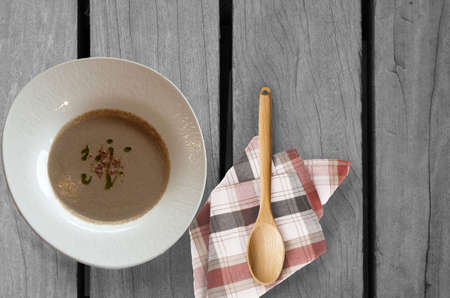 Mushroom soup on wooden tableの写真素材