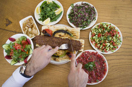 Kebab eating and adana kebab menuの写真素材