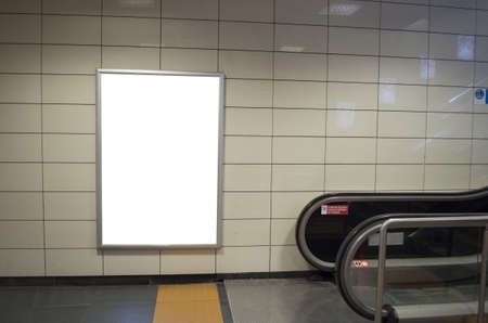 modern hallway of airport or subway station with blank billboards on wall