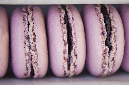 French purple macarons in a gift box