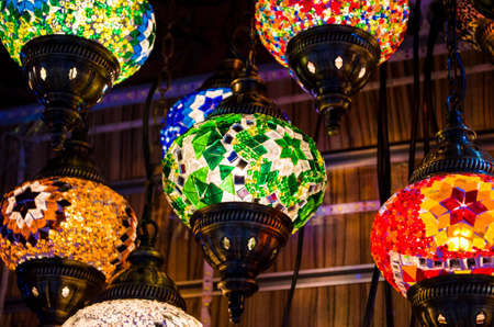 Row of traditional handmade turkish lamps in souvenir shop middle east culture concept horizontal