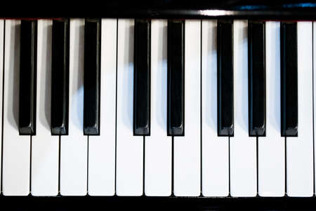 piano keyboard black and white theme top view with dark vignette