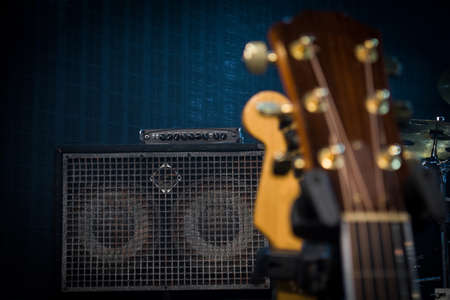 electric guitar and classic amplifier on a dark backgroundの写真素材