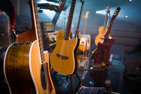 guitars stage composition in a vintage concert hall on light backgroundの写真素材