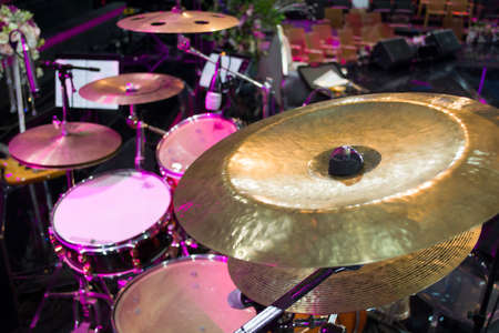 drum set and music notes in concert studioの写真素材